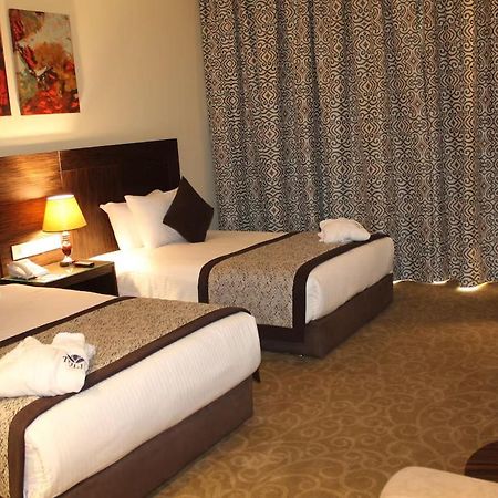 Tolip El Forsan Hotel Ismaília Exterior foto A room at the hotel